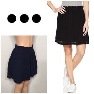 Three Dots double gauge navy short skirt. NWOT
